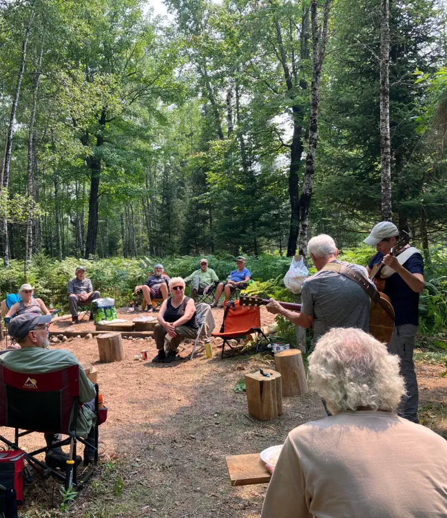 Float the Fire 2025 event with music out in forest Float the Fire event in 2025 with music out in forest