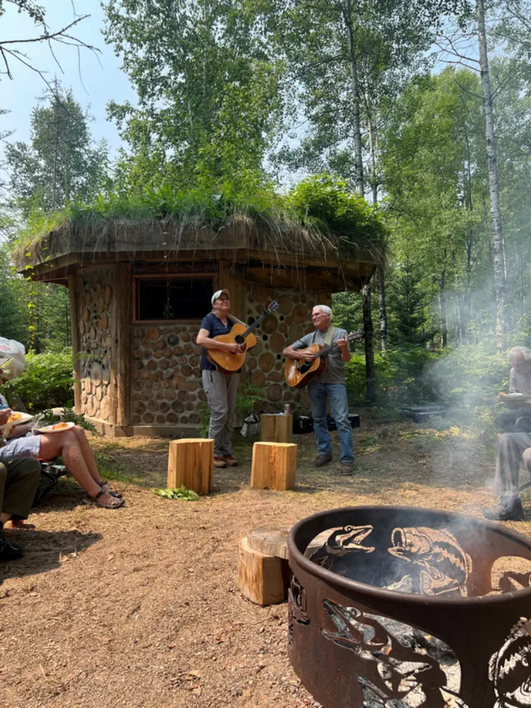 Playing music in front of park shelter