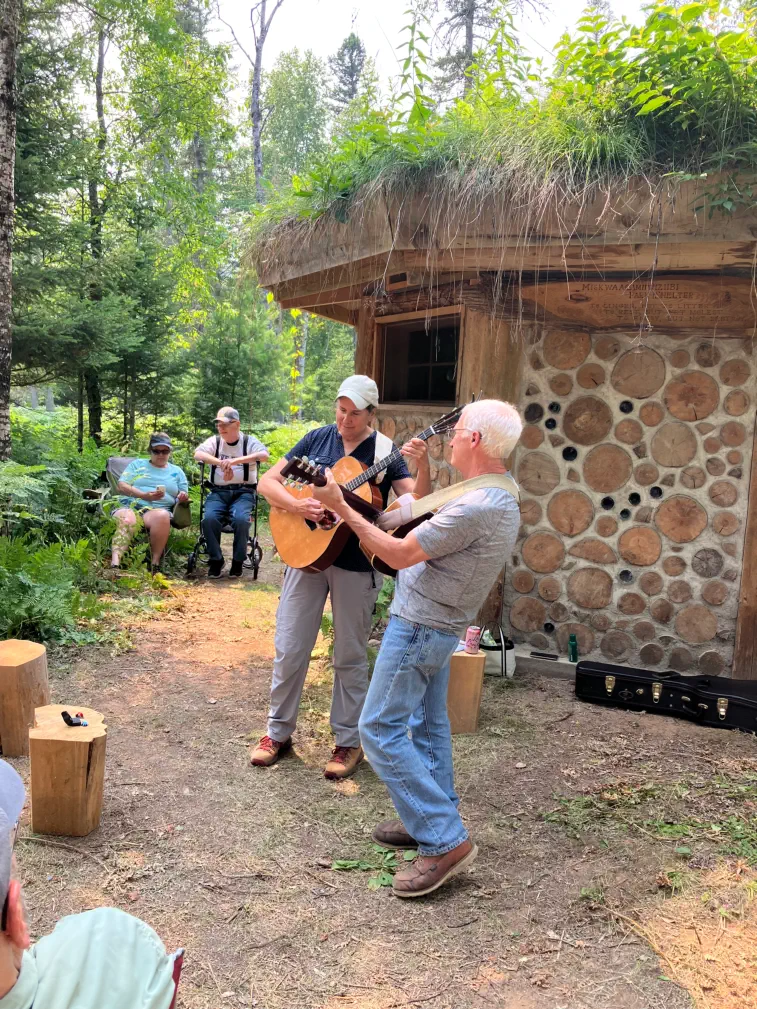 Playing music in front of park shelter
