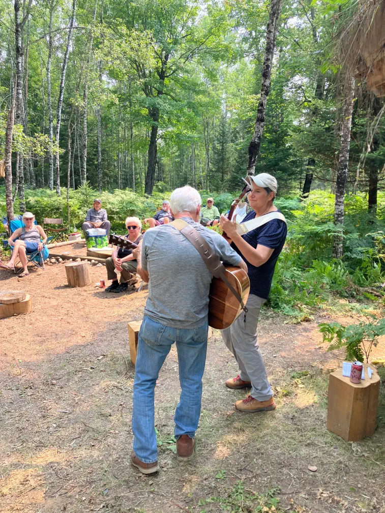 Playing music in front of park shelter