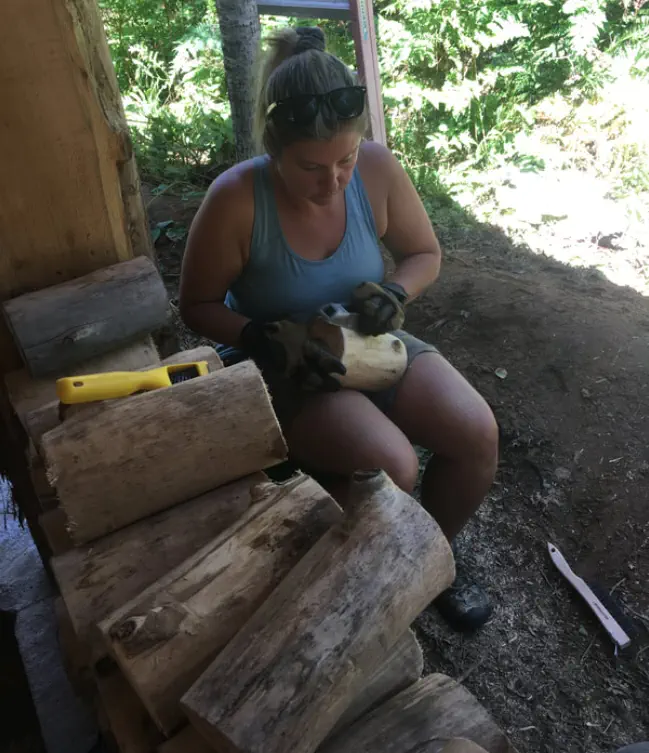 Barbara rasping log ends