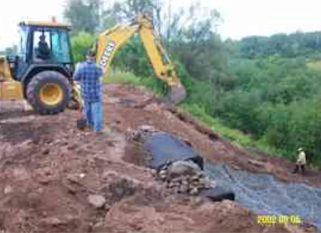 Backhoe on top of hill