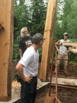 nine large cedar posts were brought in to the site on foot and erected at the corners