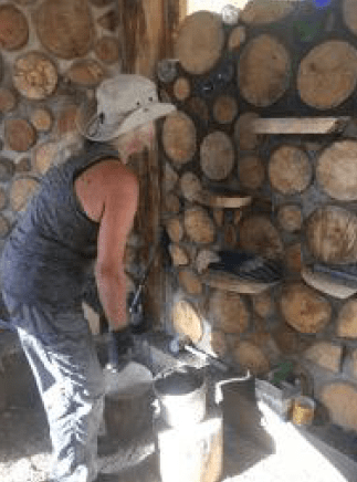 Laurie Jackson attends to detail on an inside wall